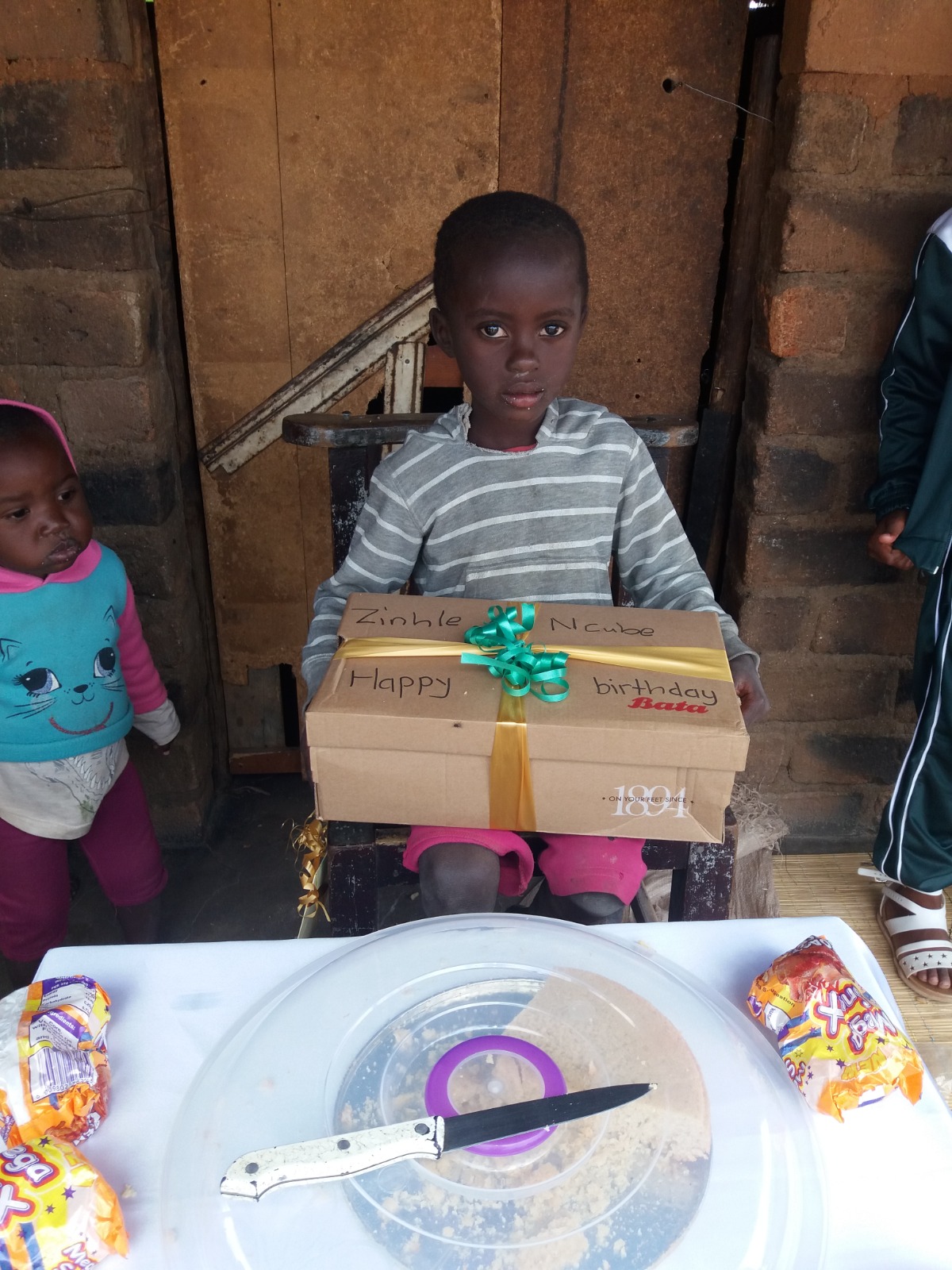 A child-headed household, supported